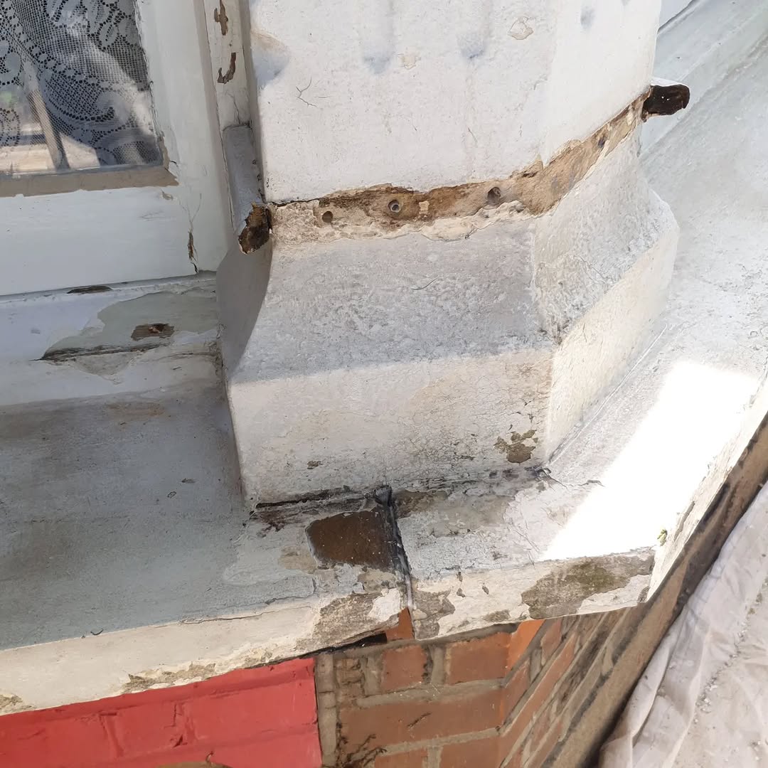 Exterior before — peeling damaged paintwork