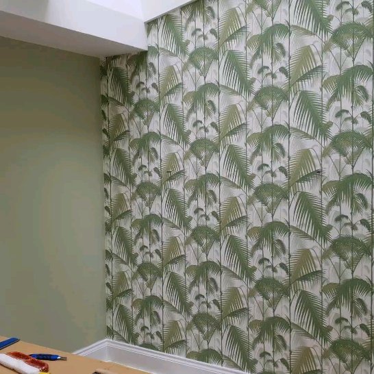 Palm leaf wallpaper feature wall